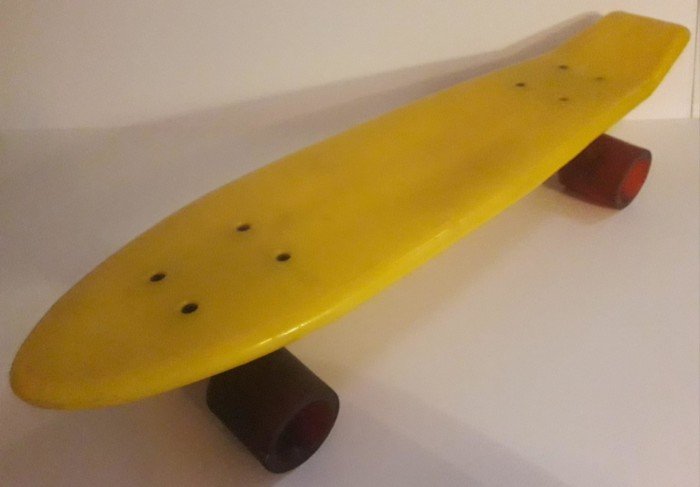 Skateboard jaune des années 80′