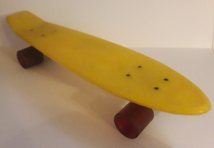 Skateboard jaune des années 80′